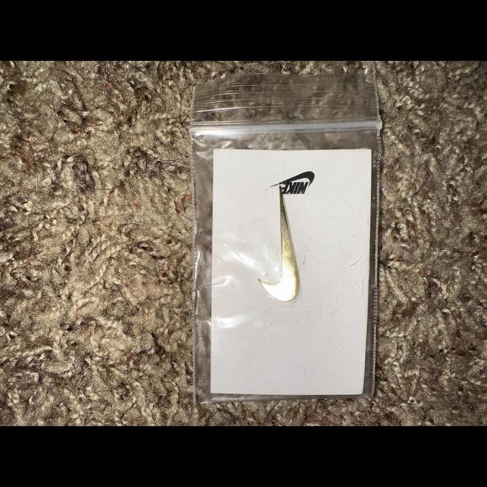 Nike Metallic Gold Swoosh Logo Pin